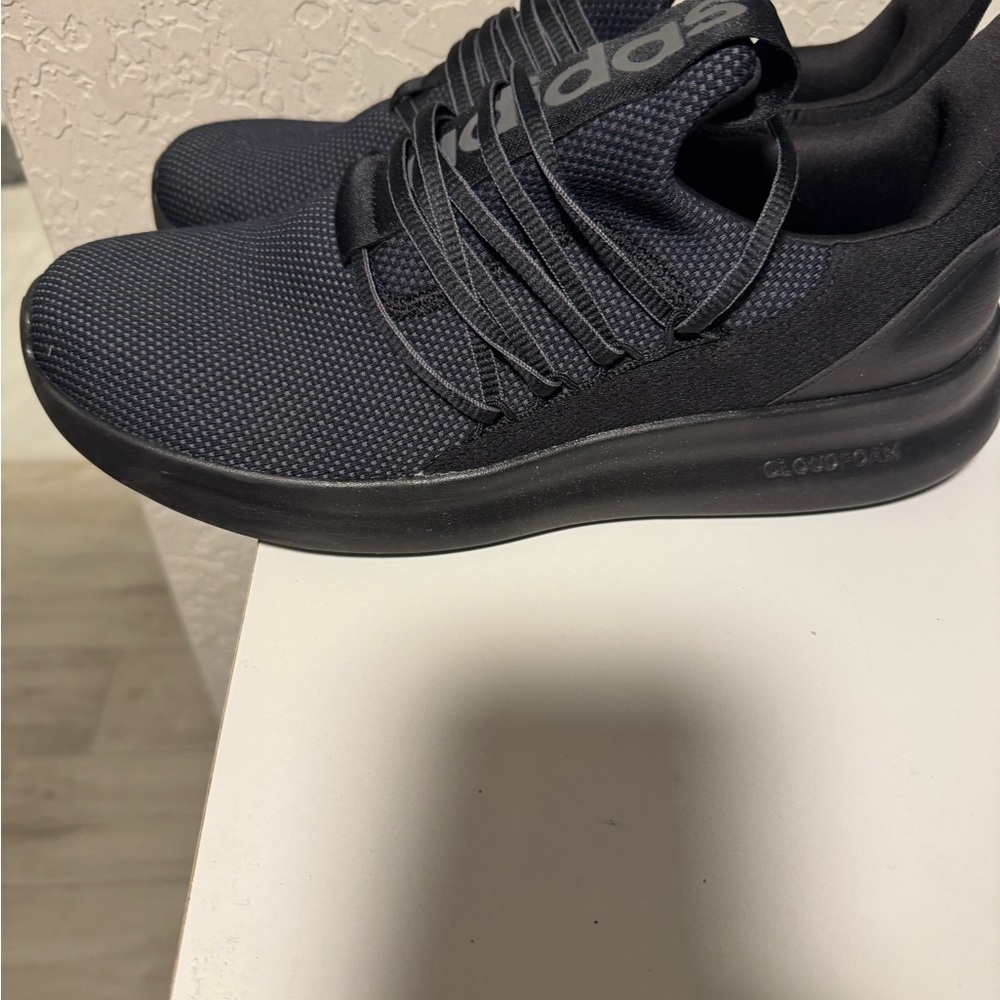 Adidas lite racer worn once 11 wide slip on Black Athletic Shoes